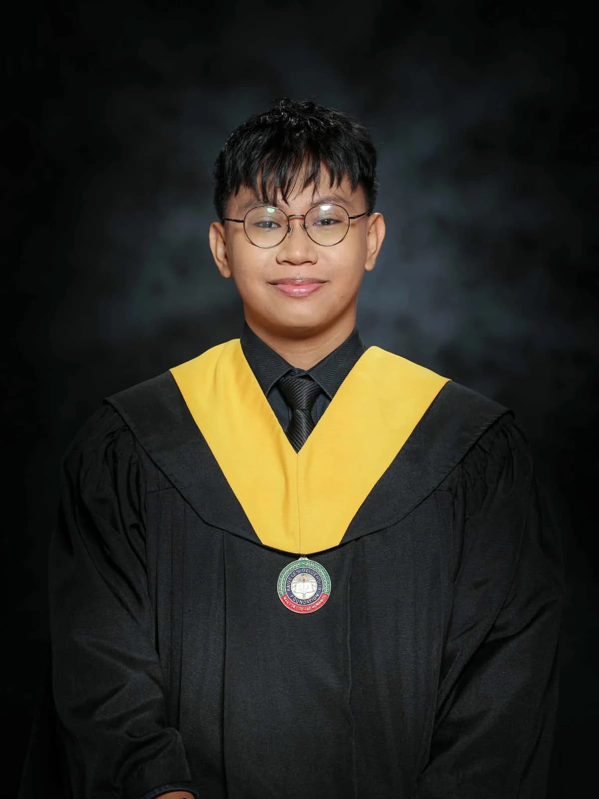 Wrenz Ivan Laylo in graduation attire